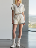 Off-White Satin V-Neck Cropped Top And Shorts Set With Contrast Stripes